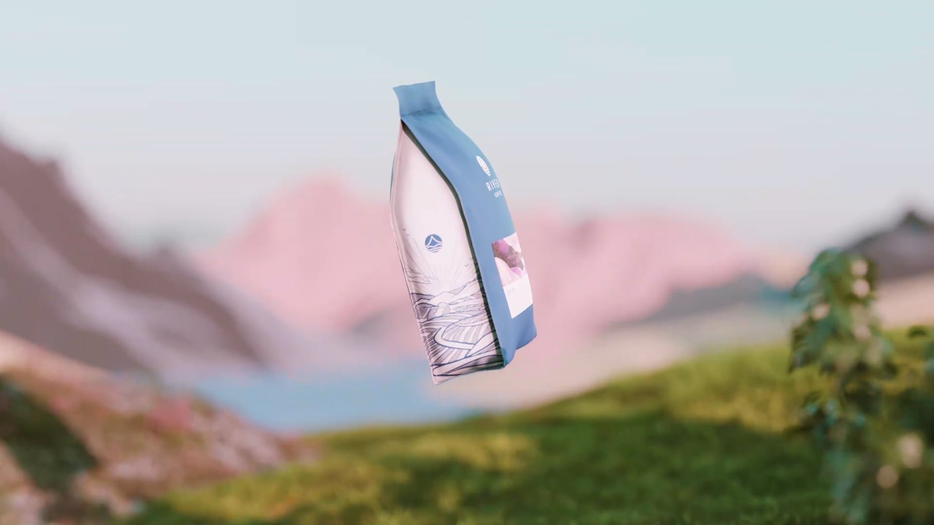a coffee bag suspended in air amongst mountains and grass