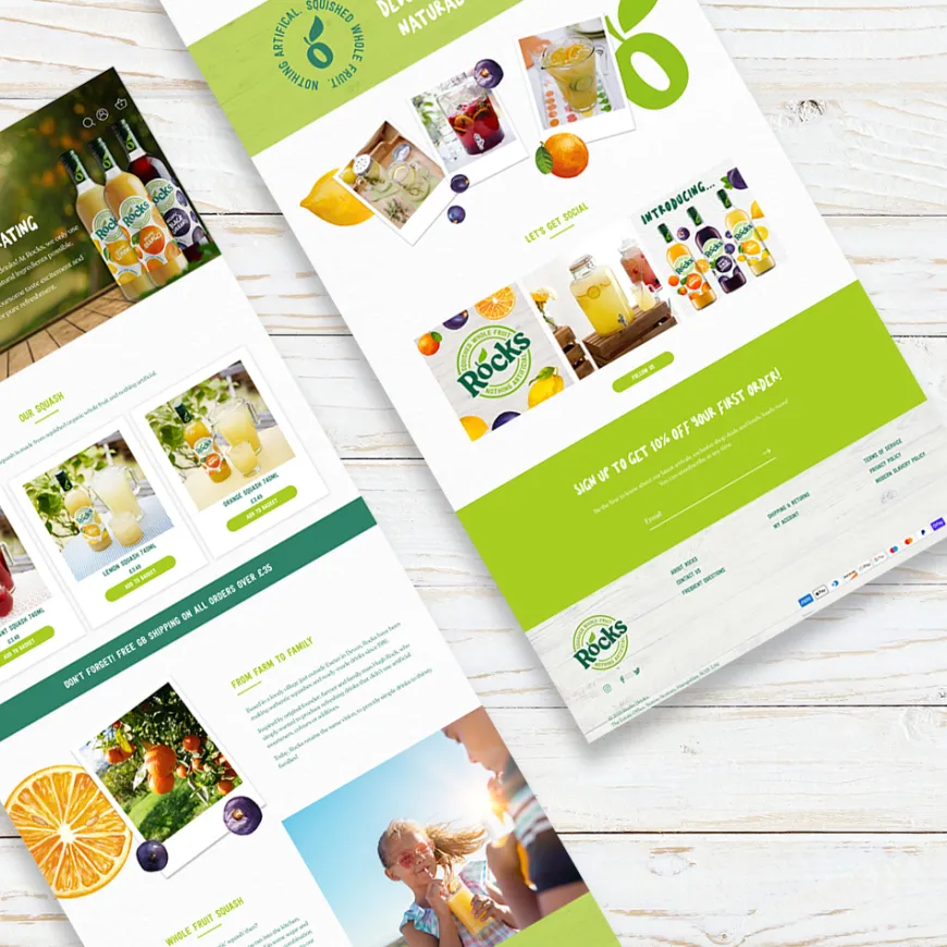 two renders of website pages with greens and fruit motifs on a wooden table